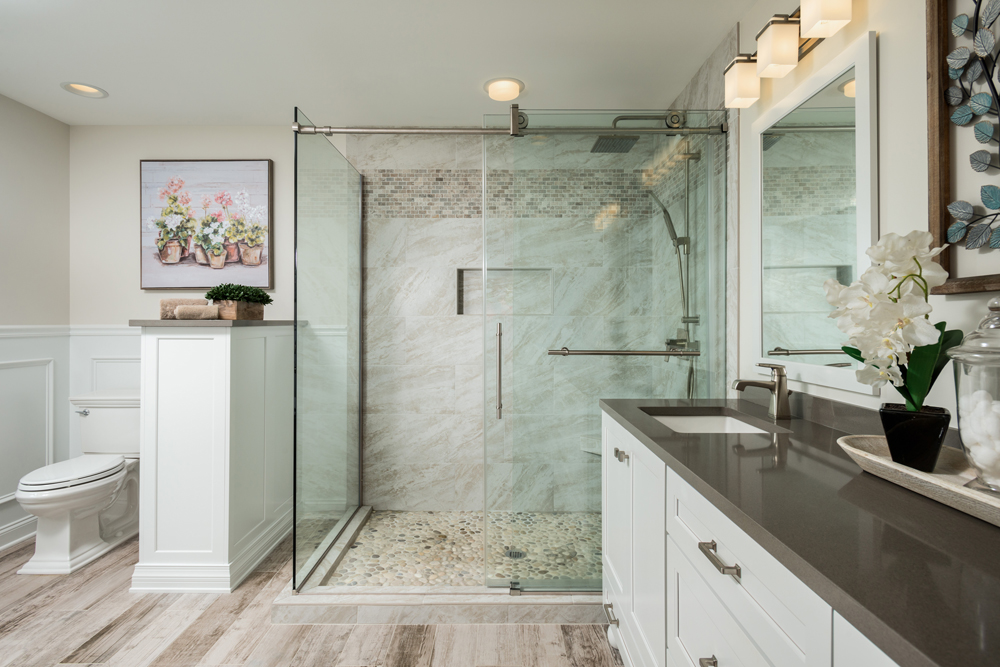 brown and grey bathroom with glass shower brown and grey bathroom with glass shower Kitchen and Bath World
